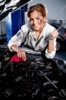 10595460-Female-mechanic-fixing-a-car-at-the-garage-Stock-Photo-woman.jpg